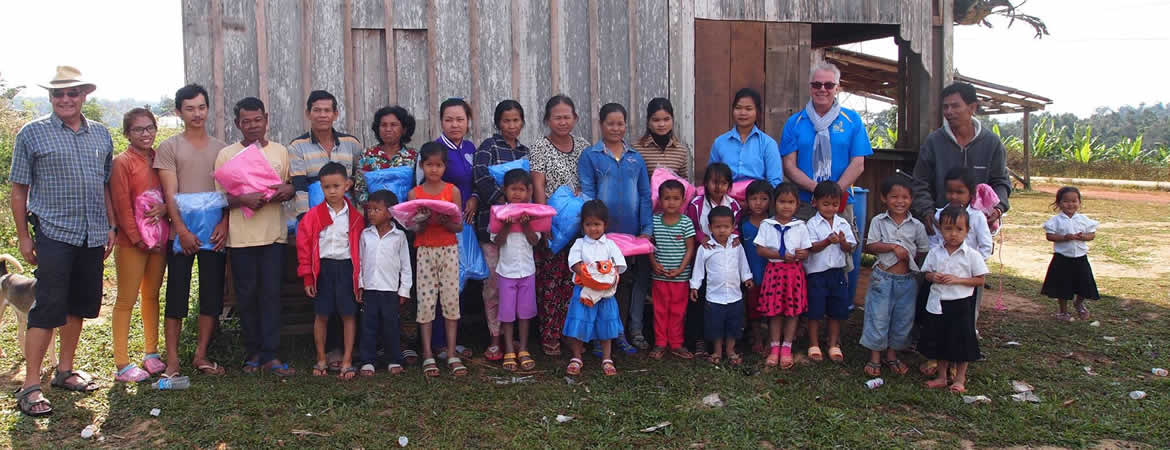 Colleagues from Phnom Pehn Rotary Club distribute mosquito nets part funded by Amwell Rotary